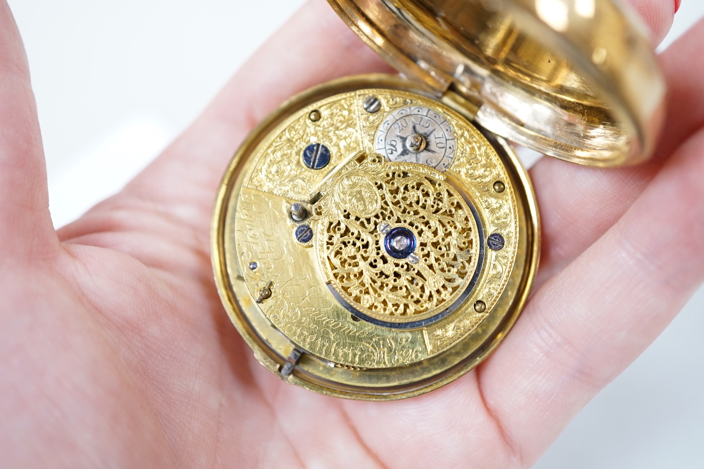 A 19th century gilt metal and polychrome enamel pair cased keywind verge pocket watch by Rigly, Roe & Newcomb of London, case diameter 52mm.